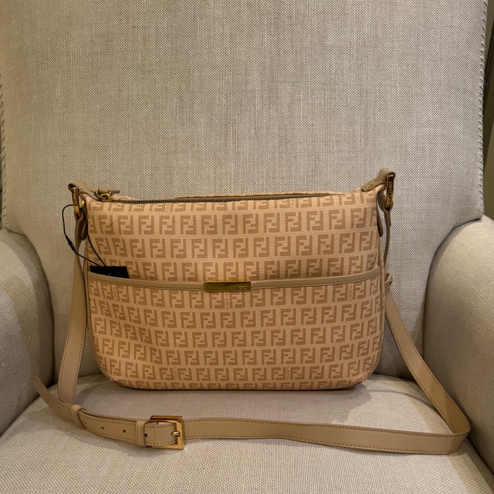 Fendi Spalmati Vitel Beige coated canvas Crossbody Bag with Gold hardware.